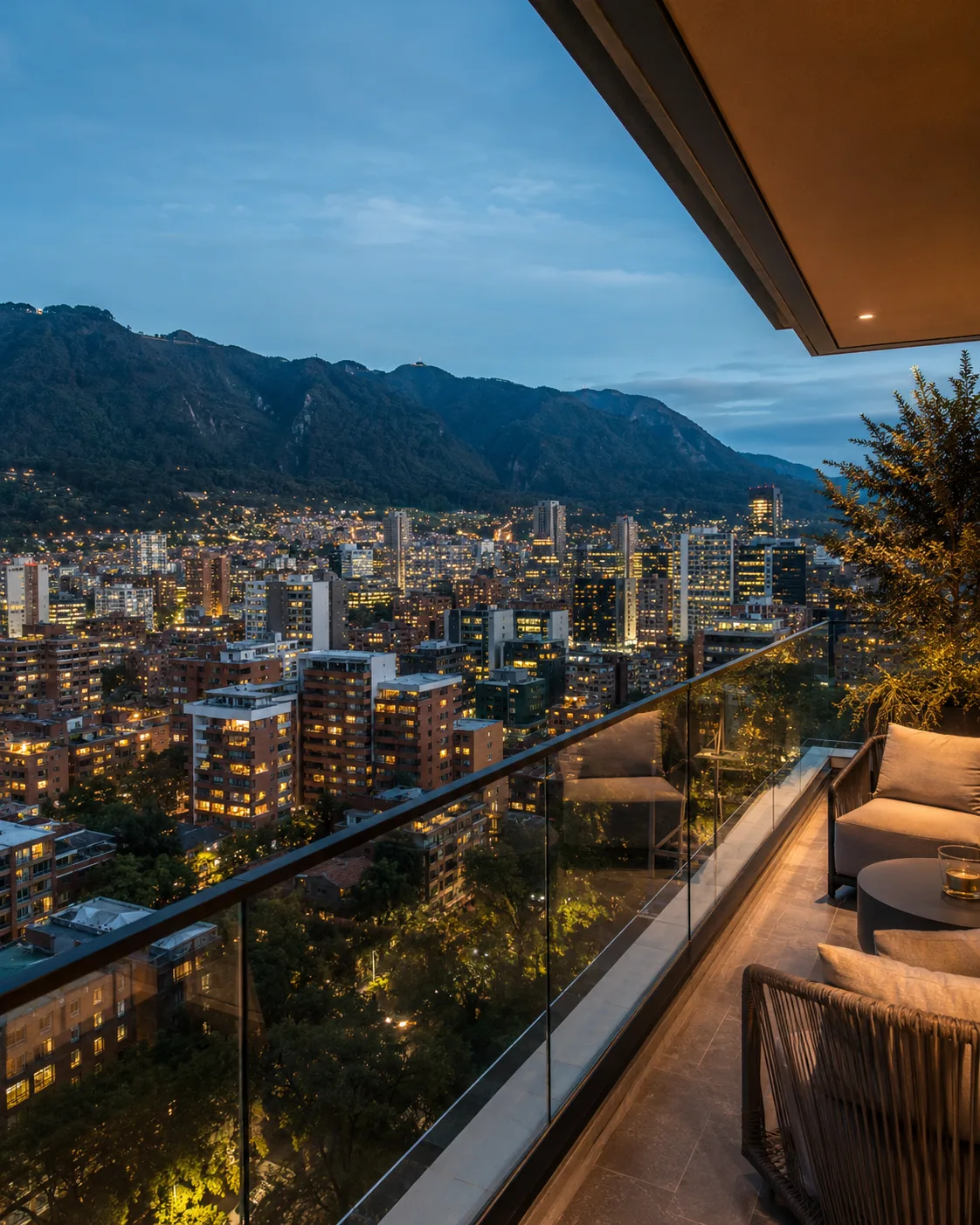 Private high-rise balcony in Rosales Bogotá overlooking the city at dusk